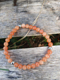 Bracelet artisanal en jaspe orange naturel aux teintes chaleureuses avec séparateurs acier inoxydable - BySHELLDA