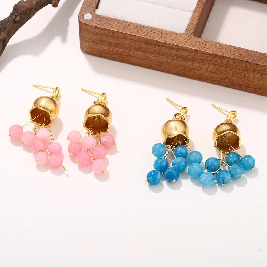 Boucles d’oreilles fantaisie grappe – finition dorée 18K – vue produit 1 – BySHELLDA